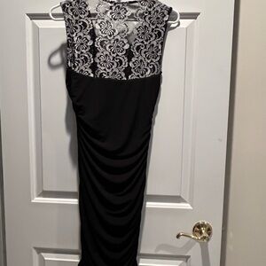 Black dress size 6. Never worn